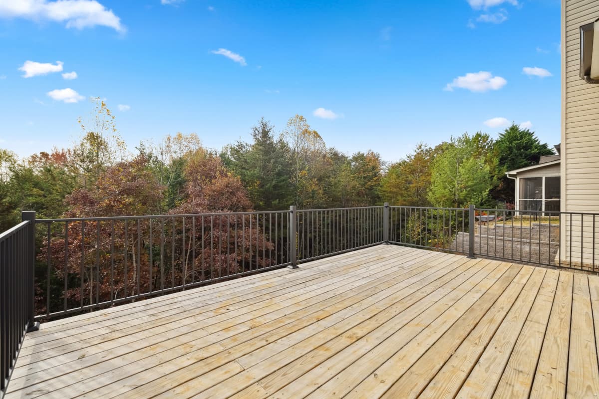 Pressure-treated deck with Fortress FE26 iron railing