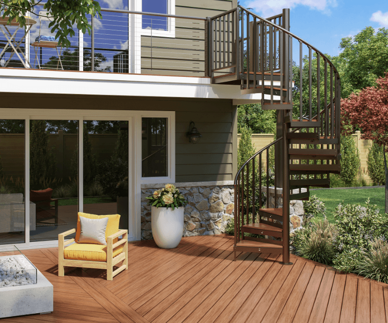 Trex Spiral Stairs Summit with a bronze frame and warm honey composite treads