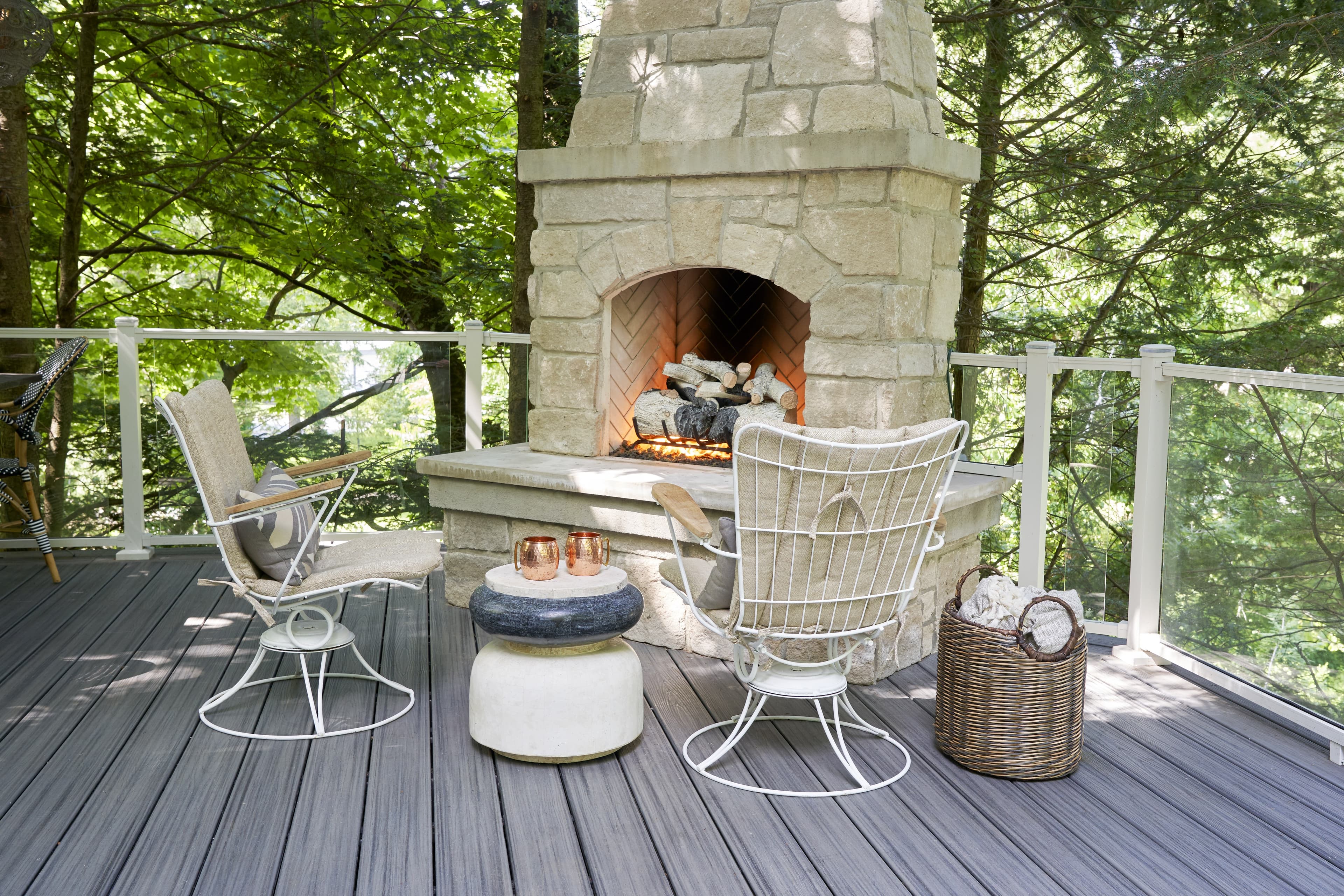 Trex Transcend Island Mist decking with fireplace and chairs