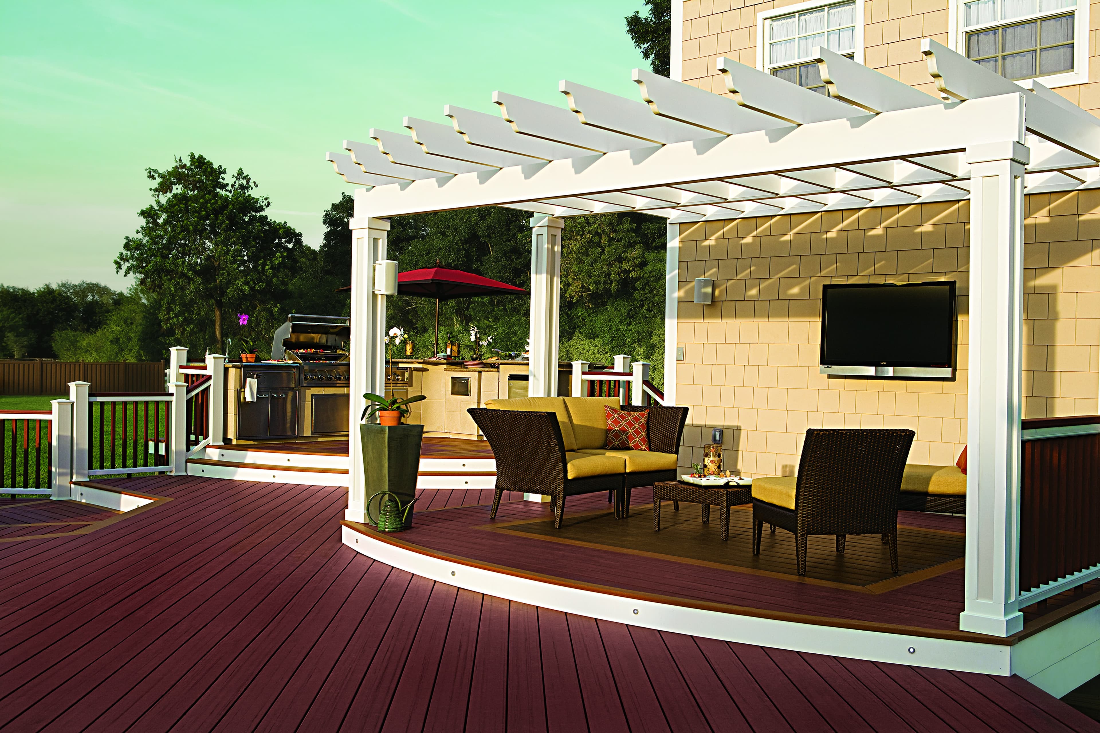 Trex Transcend Lava Rock decking with house and pergola